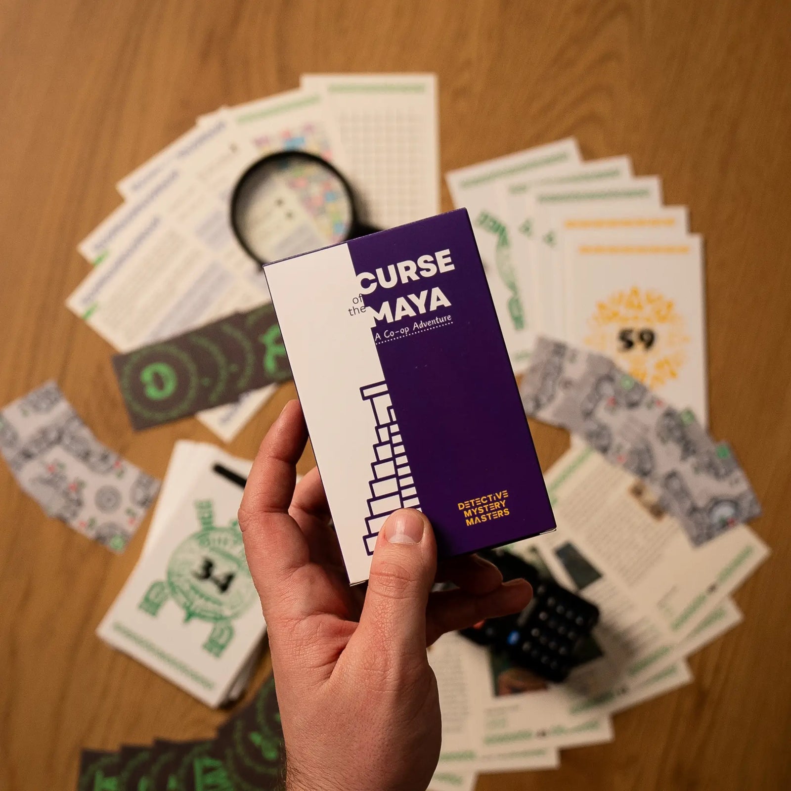 Close-up of puzzle cards from CURSE of the Maya, an immersive two-player adventure ideal for couples and friends.